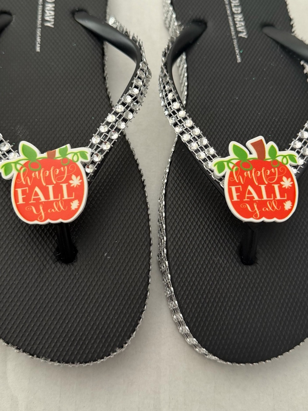 Old Navy Black Flip Flops with Rhinestone Straps and pumpkin  Charm